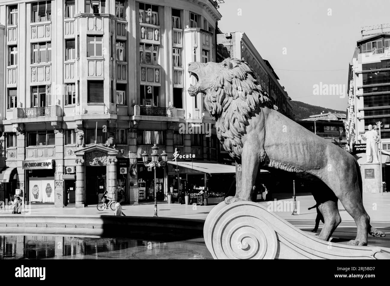Statue of a lion forming part of the fountain around the monument of Warrior on a Horse in Macedonia Square, Skopje, Macedonia. Stock Photo
