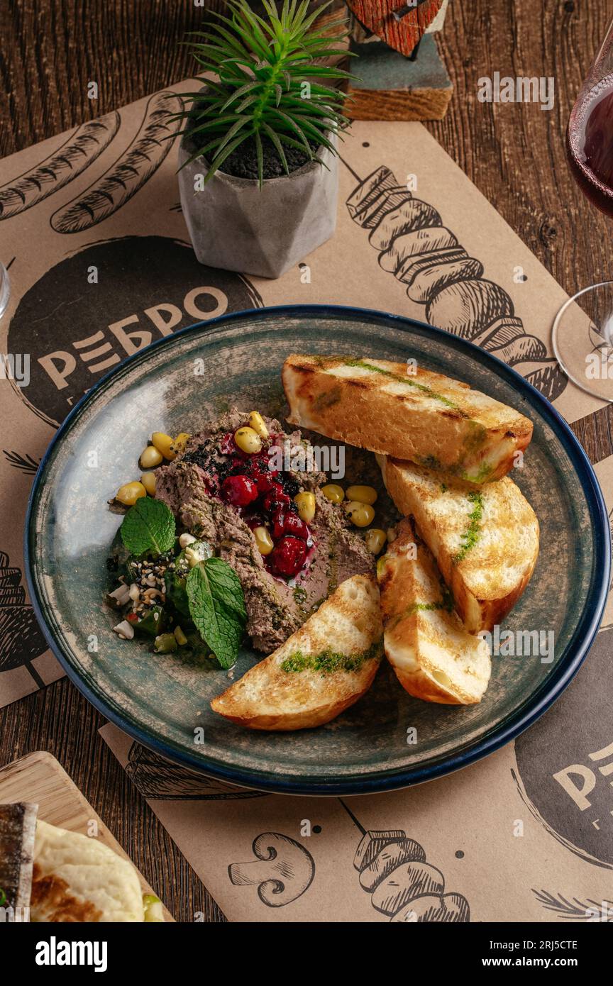 goose liver pate with croutons on a plate Stock Photo Alamy