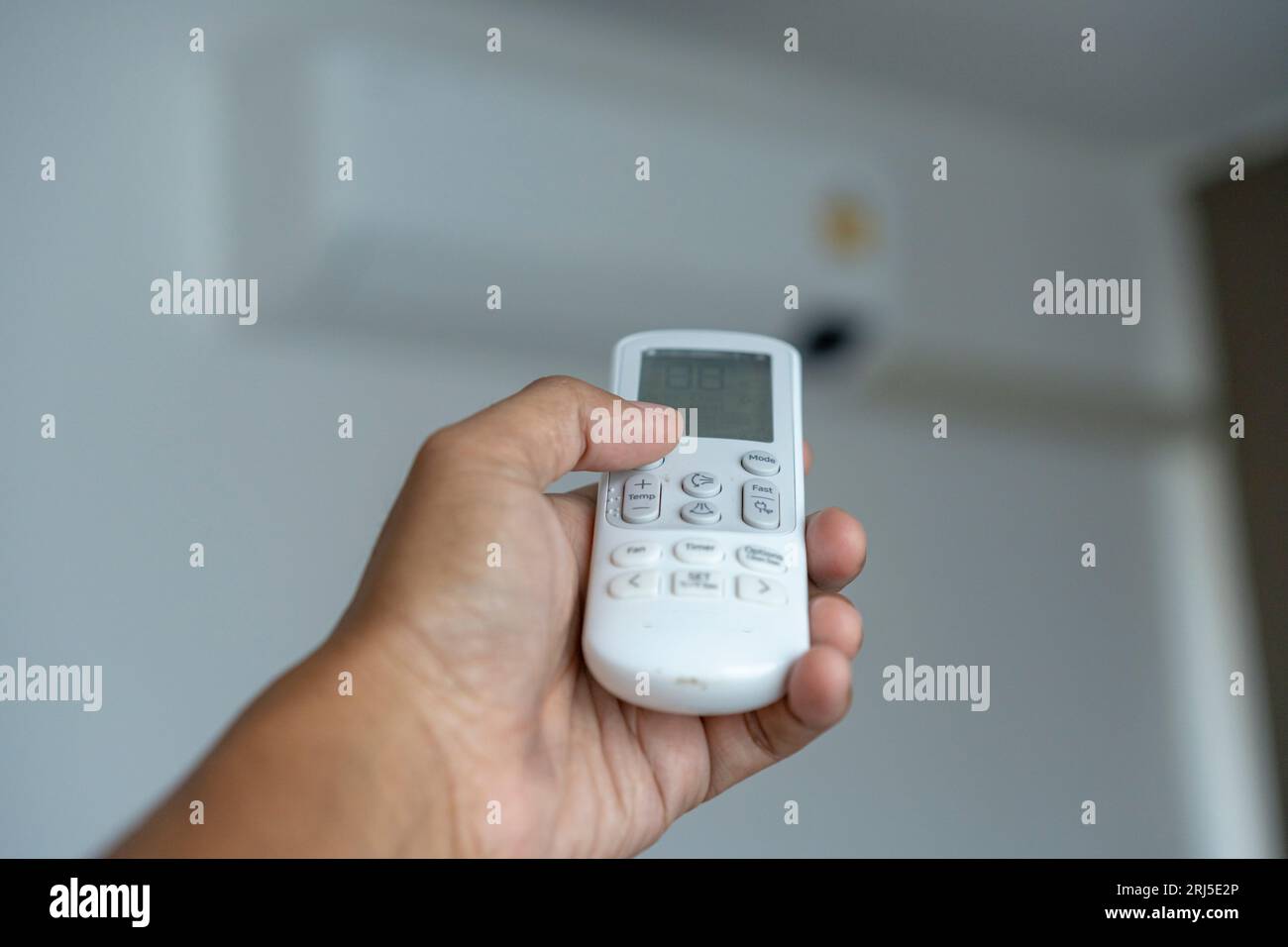 Family using air conditioning hi-res stock photography and images - Alamy