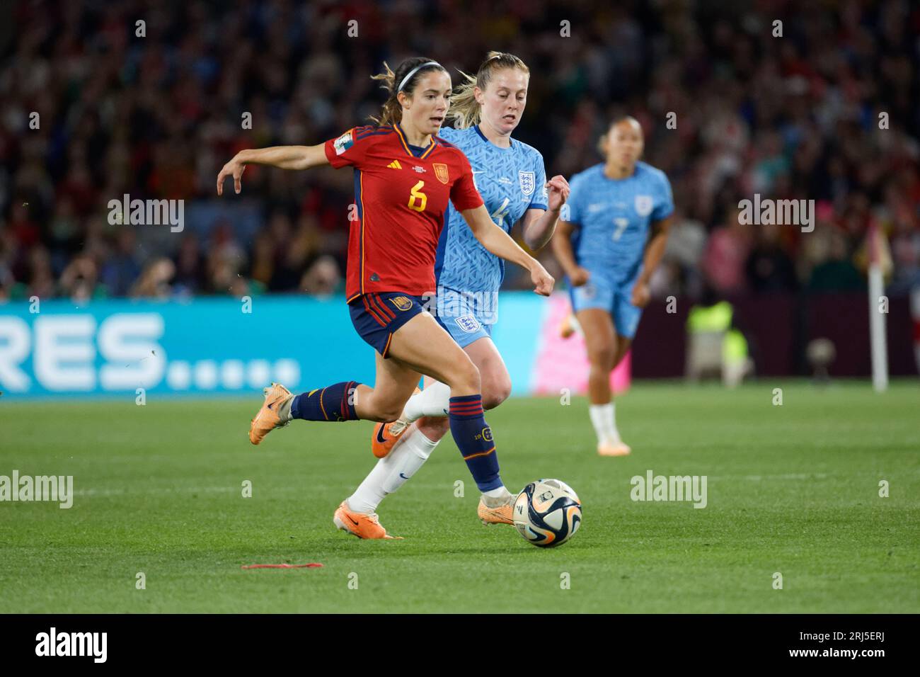 Sydney, Australia. 20th Aug, 2023. Keira Walsh of England competes for the ball with Aitana Bonmati of Spain during the FIFA Women's World Cup Australia and New Zealand 2023 Final match between Spain and England at Stadium Australia on August 20, 2023 in Sydney, Australia Credit: IOIO IMAGES/Alamy Live News Stock Photo