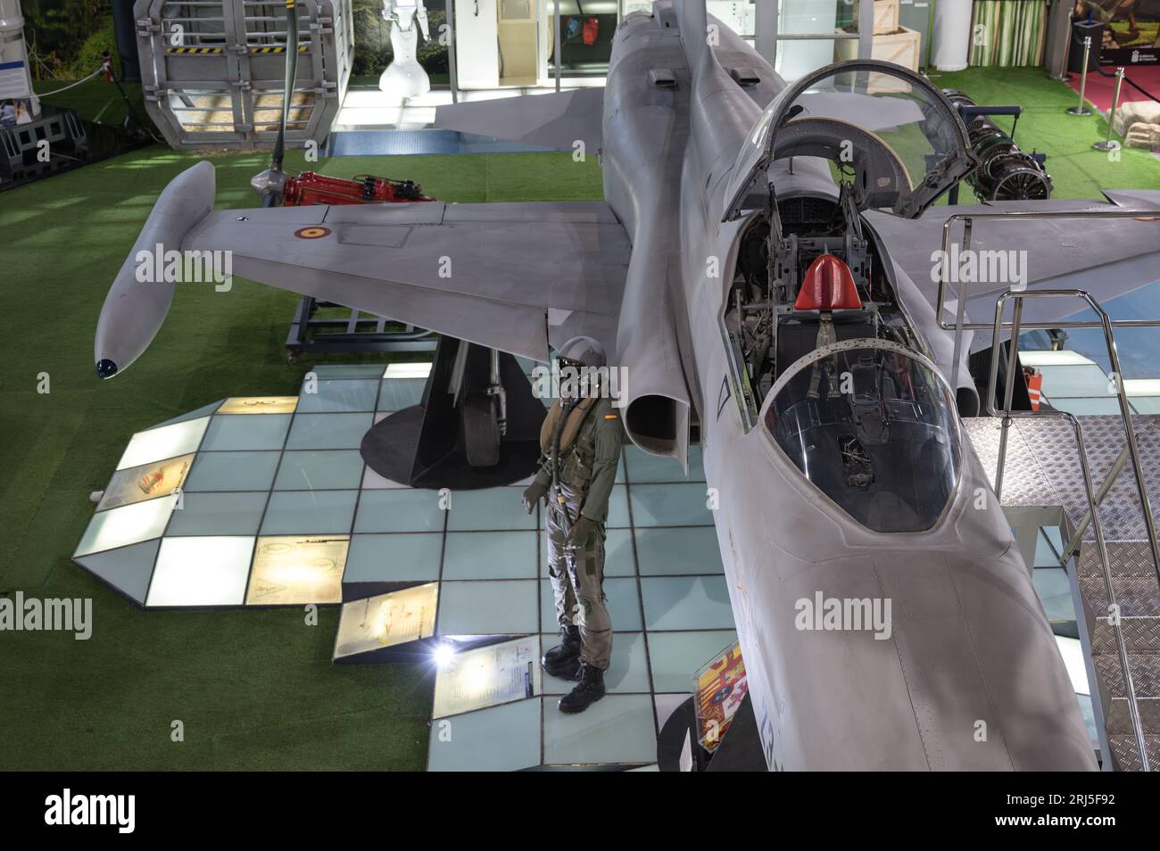 A Northrop F5 AR.9 RF-A5 fighter plane and a mannequin of the pilot Stock Photo