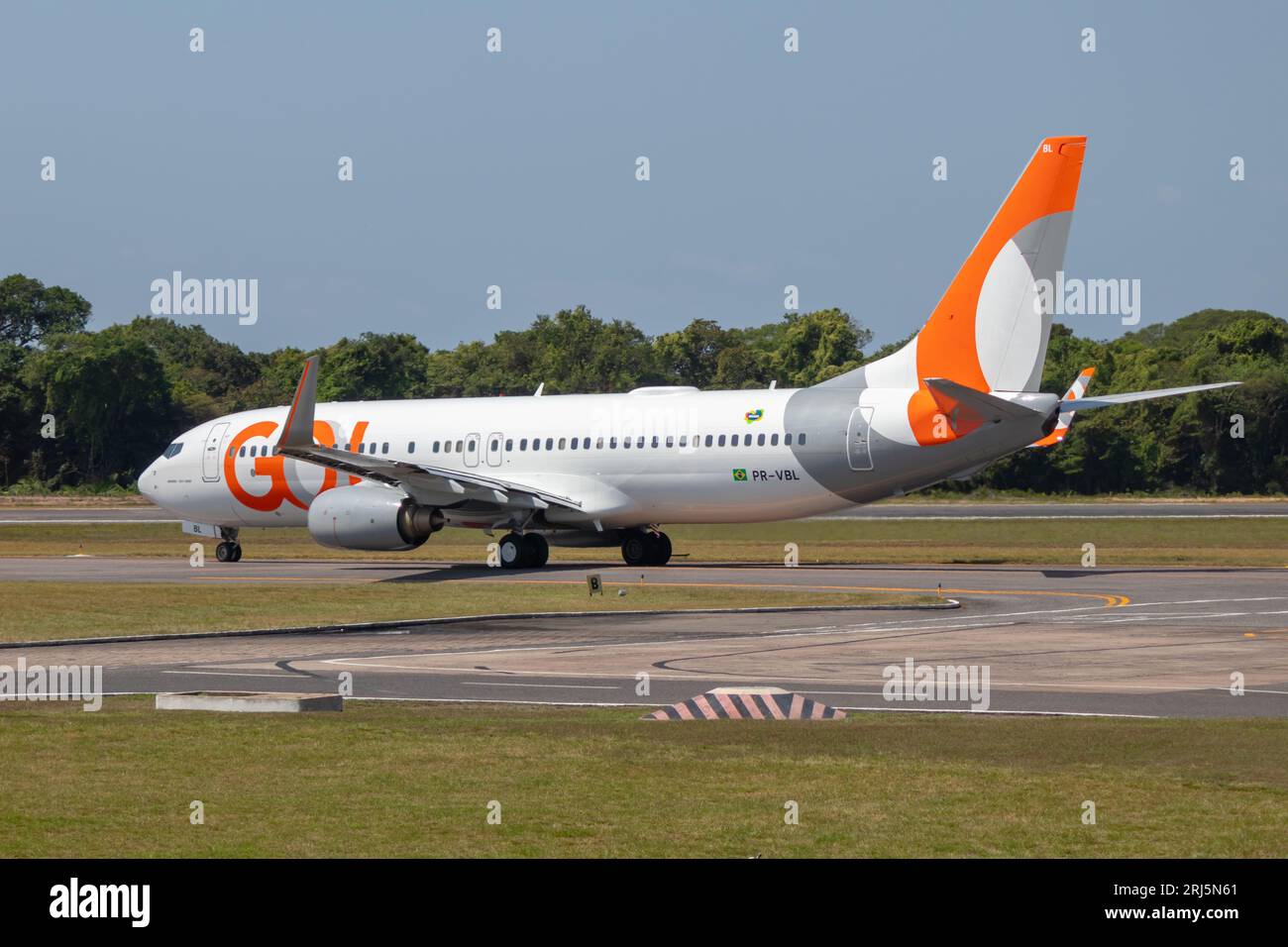 GOL Airlines plane taxis on the taxiway from Santarem Airport (SBSN). Stock Photo