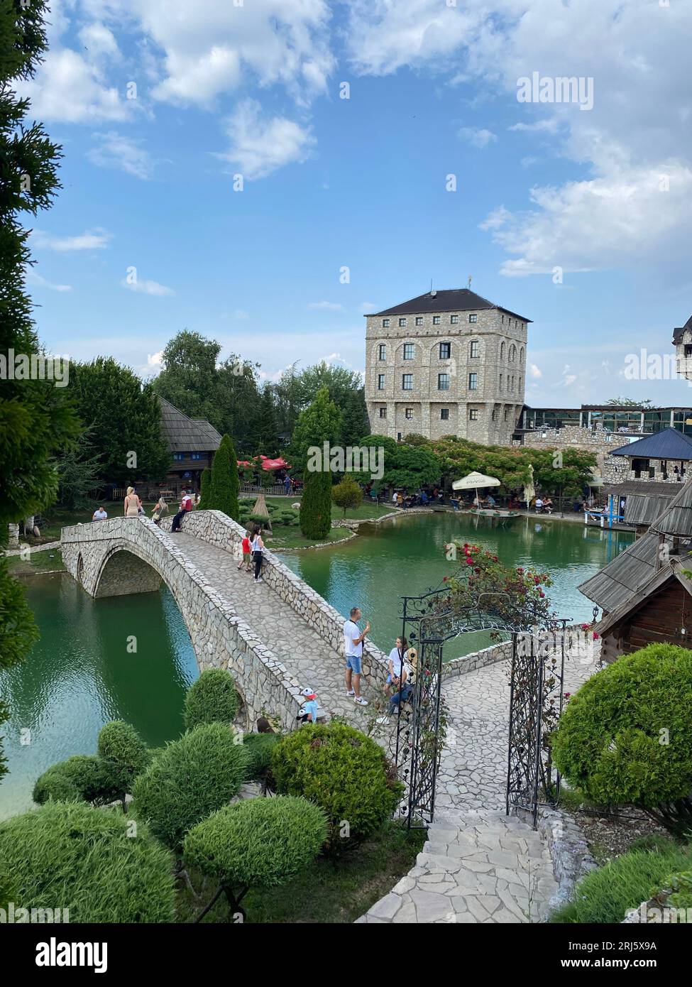 A scenic view of a river meandering through a bridge in Bijeljina, Bosnia and Herzegovina Stock Photo