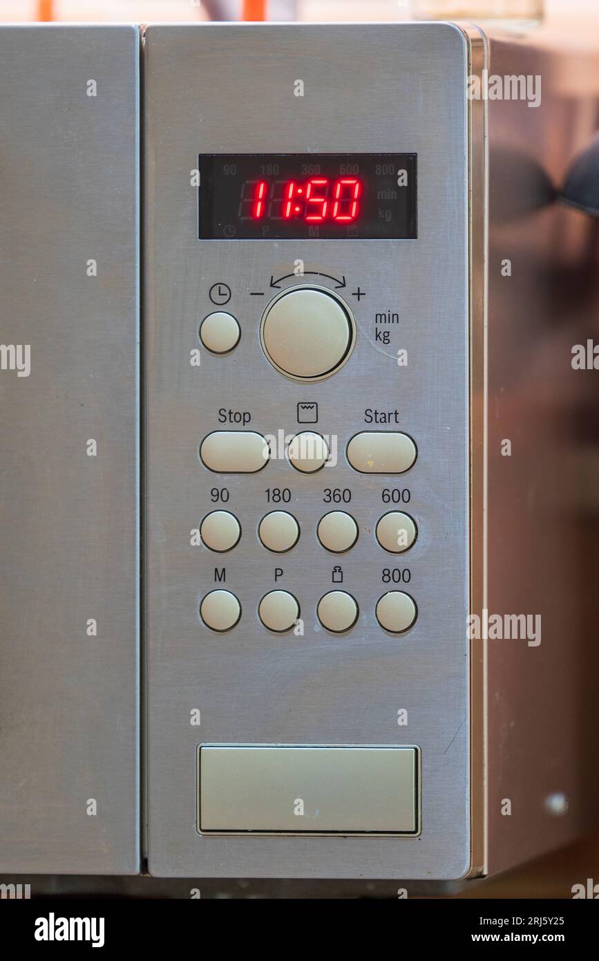 Microwave oven controls. technology in the kitchen. Stock Photo