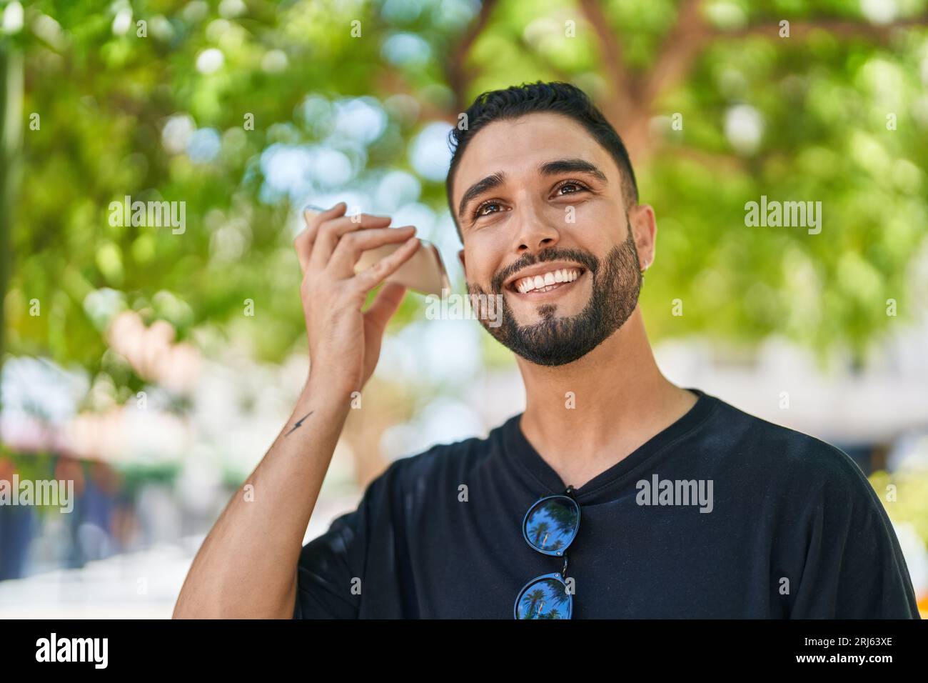 Young arab man miling confident hi-res stock photography and images - Alamy