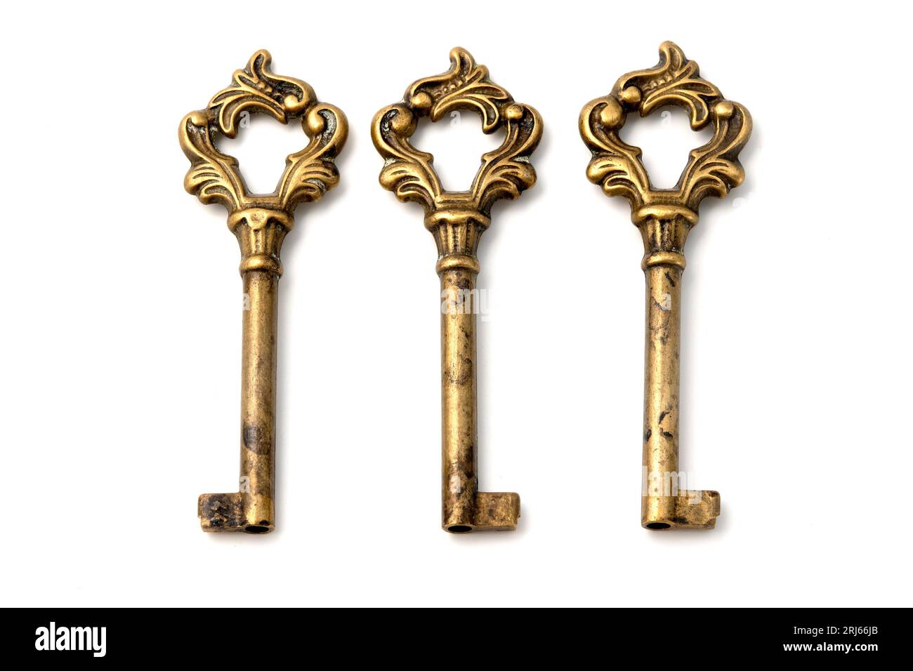 Ornate keys on a white background Stock Photo