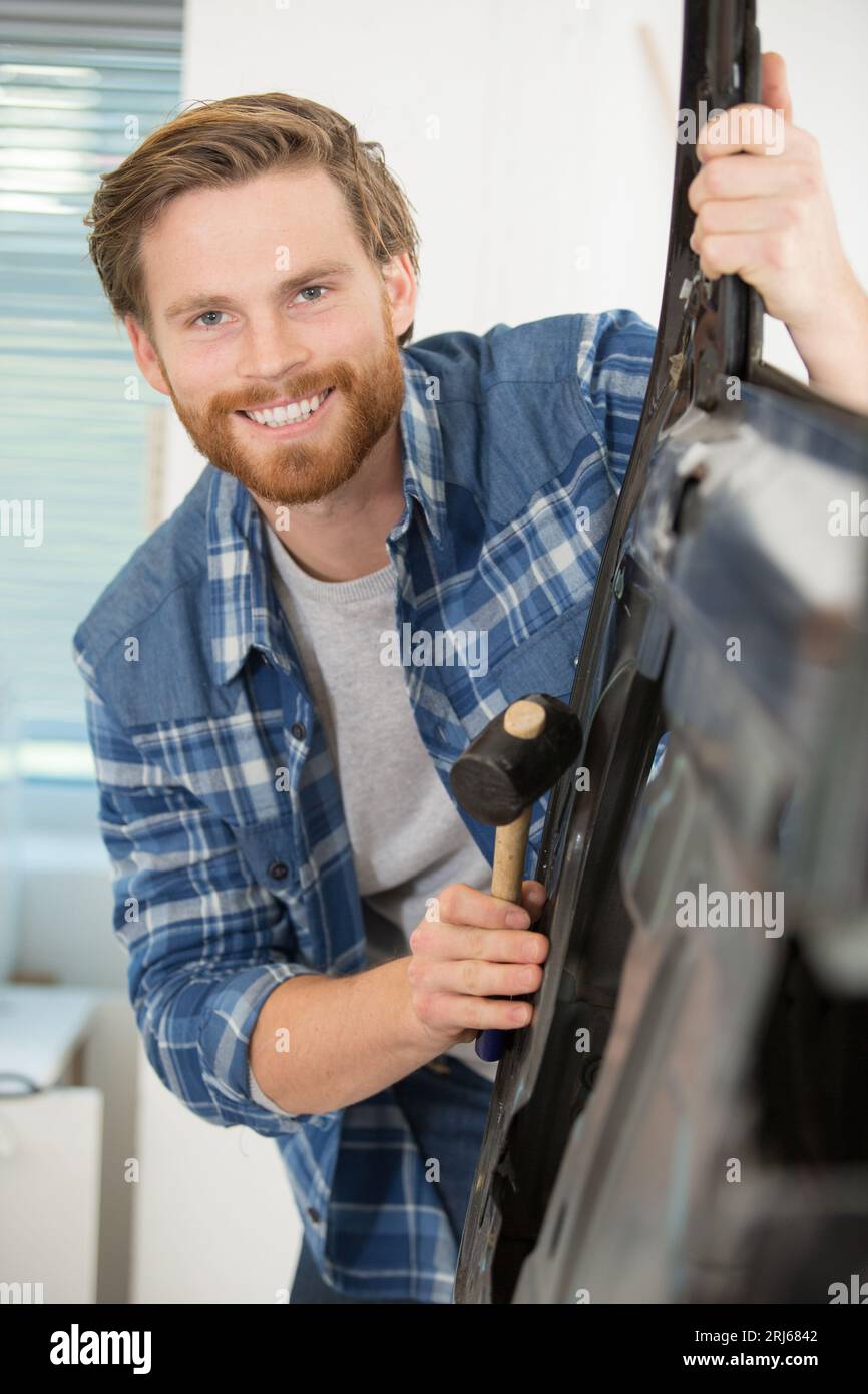 happy car body-shop worker Stock Photo