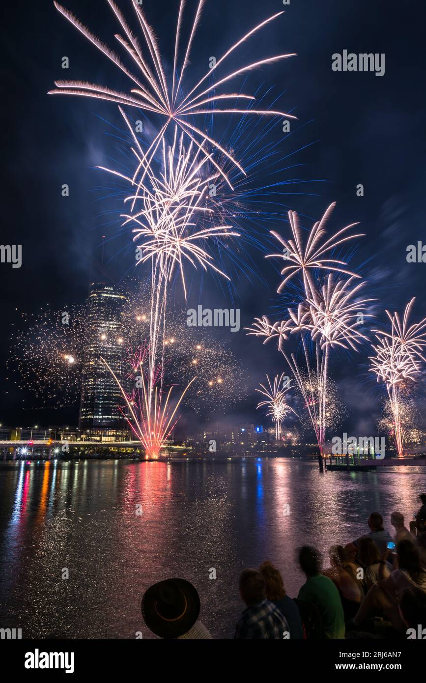 A scene of people enjoying the fireworks display during the Brisbane Riverfire event, Australia Stock Photo