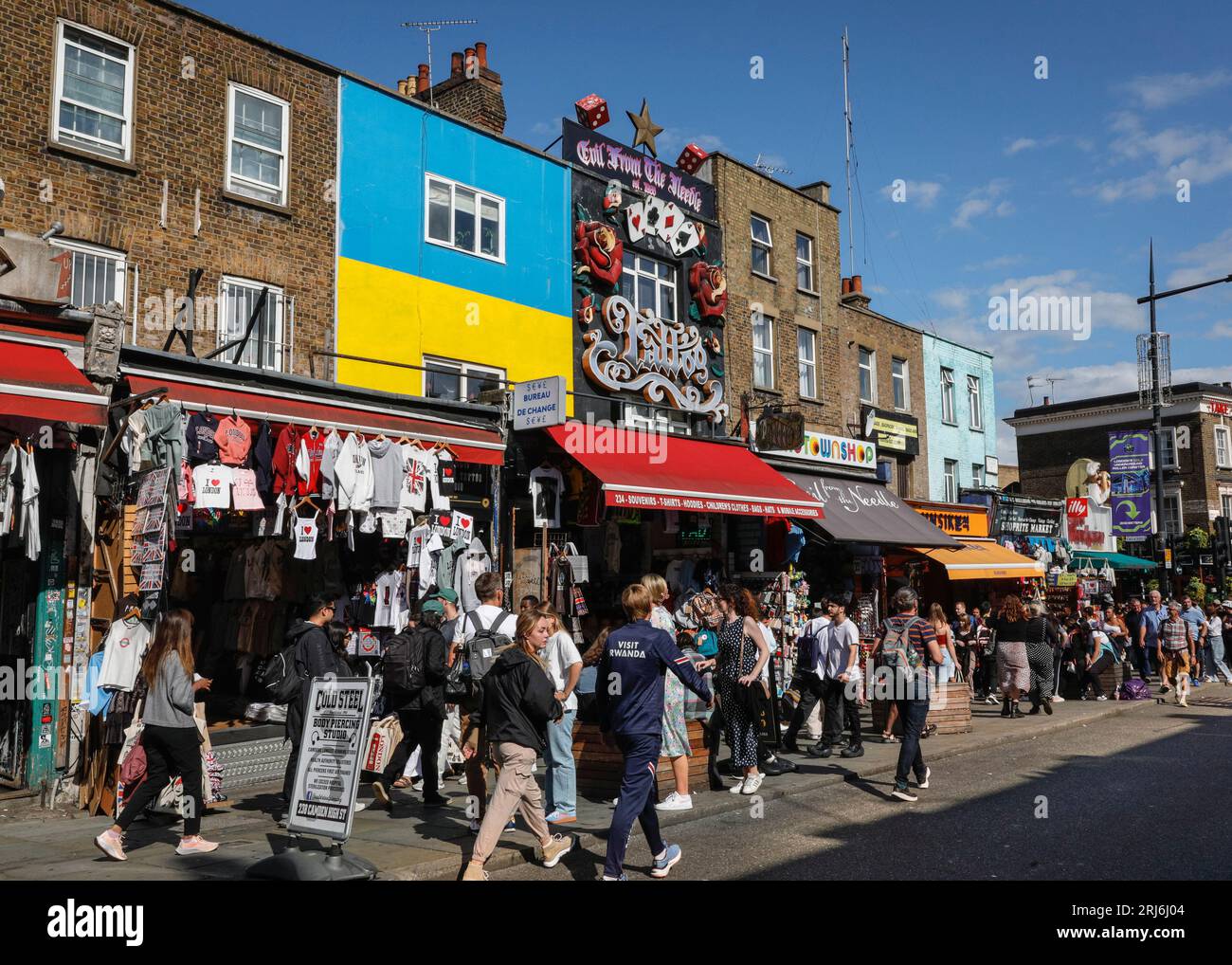 Tourists, visitors, people shopping in crowded Camden High Street, Camden Town, London, England, UK Stock Photo