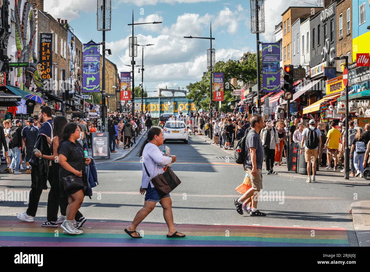 Tourists, visitors, people shopping in crowded Camden High Street, Camden Town, London, England, UK Stock Photo