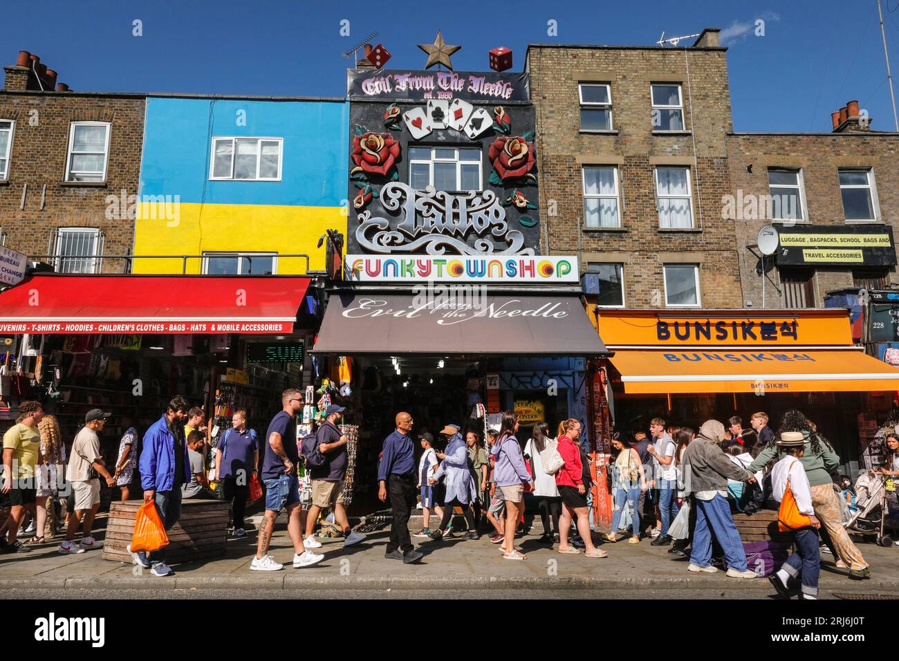 Tourists, visitors, people shopping in crowded Camden High Street, Camden Town, London, England, UK Stock Photo