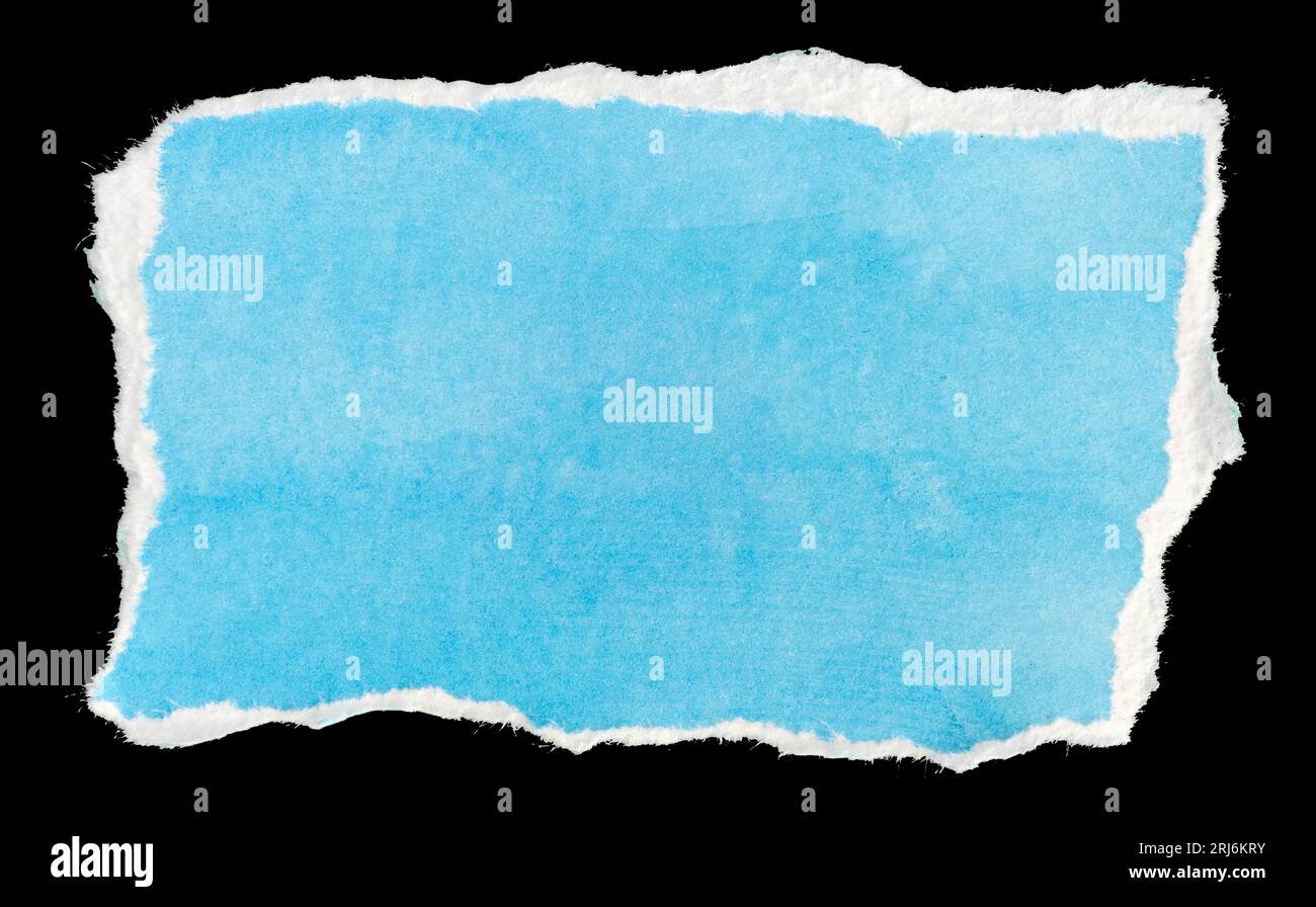 Ripped blue paper note message template isolated on black background Stock Photo