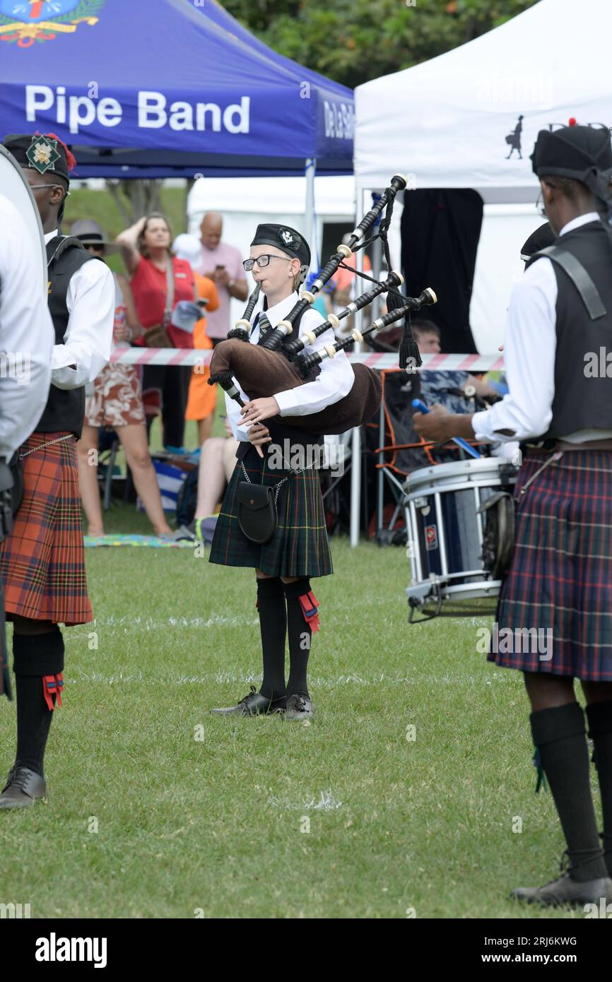 Young girl playing bagpipe, pipes and drums band competition, 60th