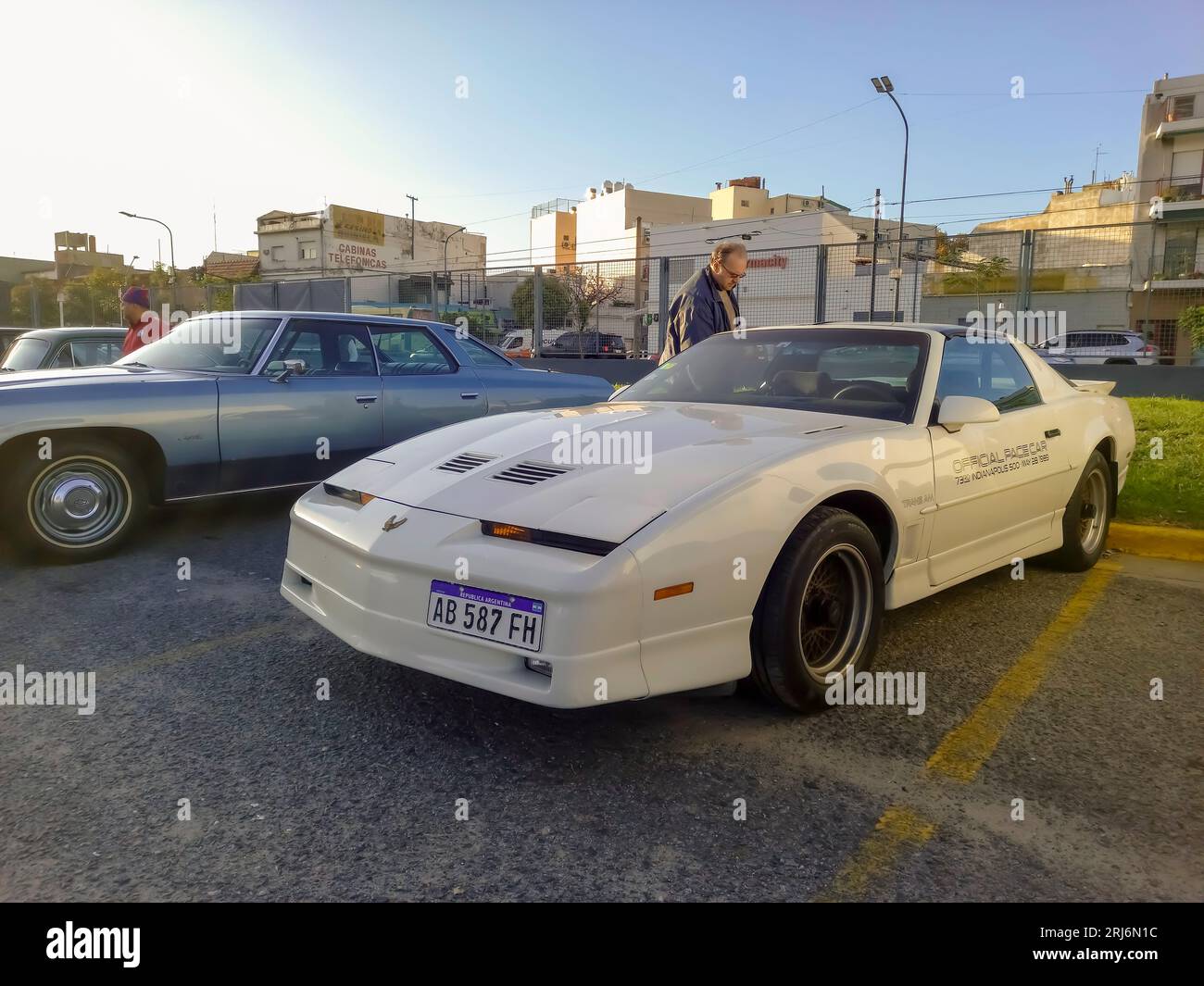 Old white sport 1989 Pontiac Firebird Trans Am Indy 500 pace car in a parking lot. Classic muscle car. Stock Photo