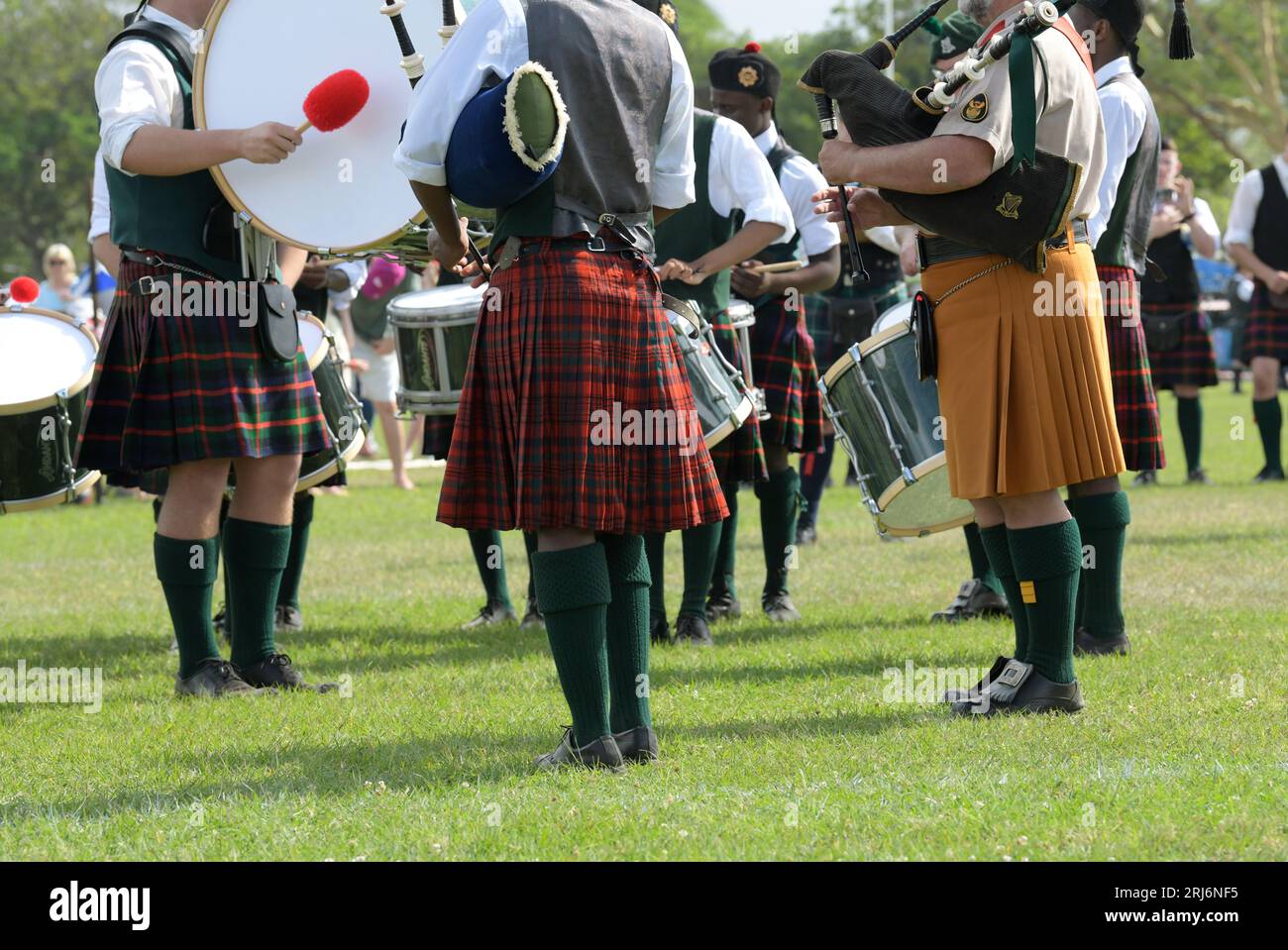 Tartan kilt, Scottish dress, traditional culture, legs of pipes and