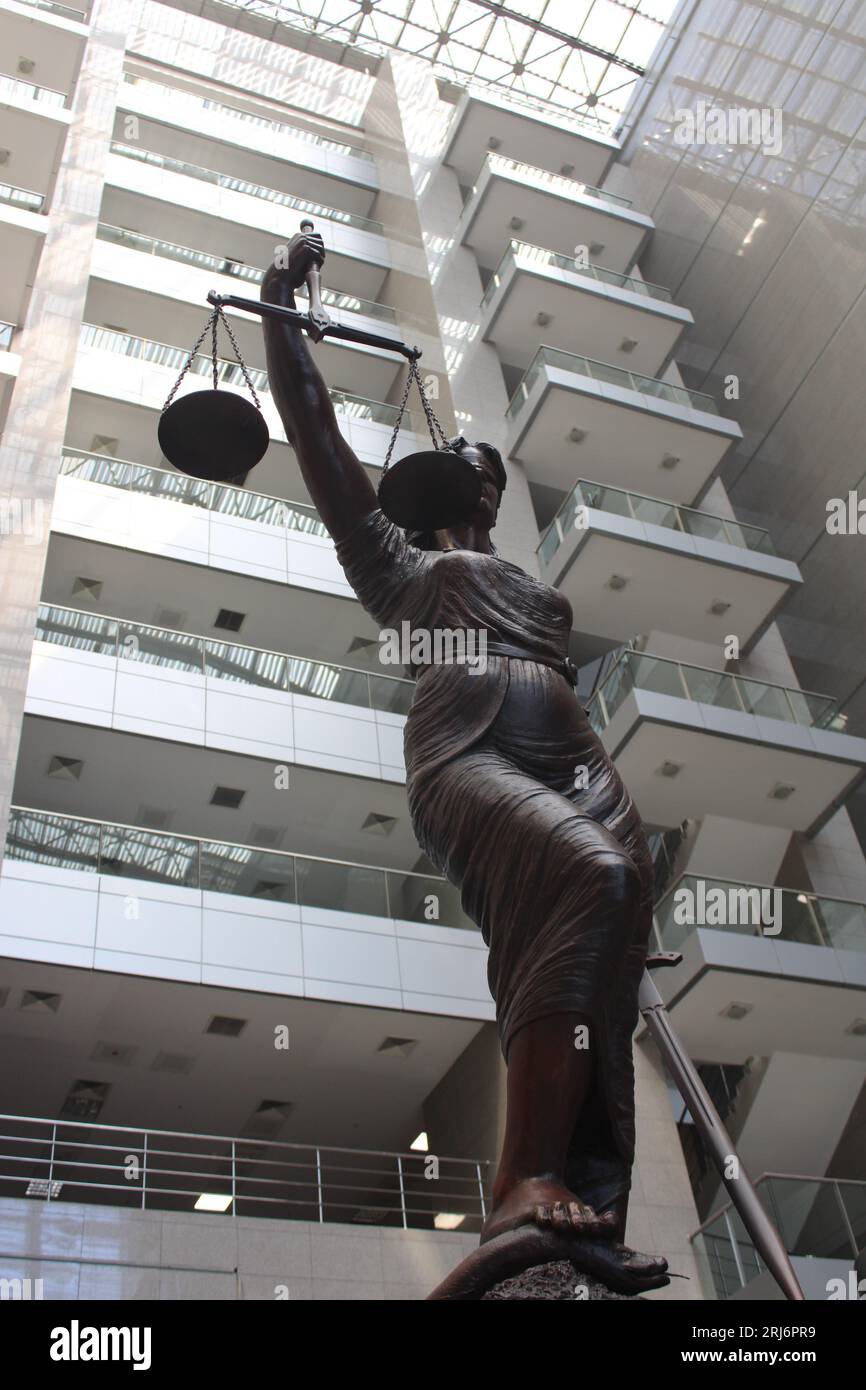 Statue of a female judge representing justice and law inside the