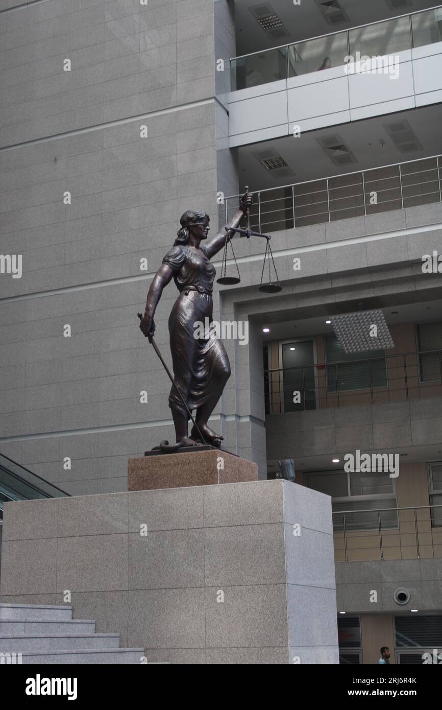 Statue of a female judge representing justice and law inside the