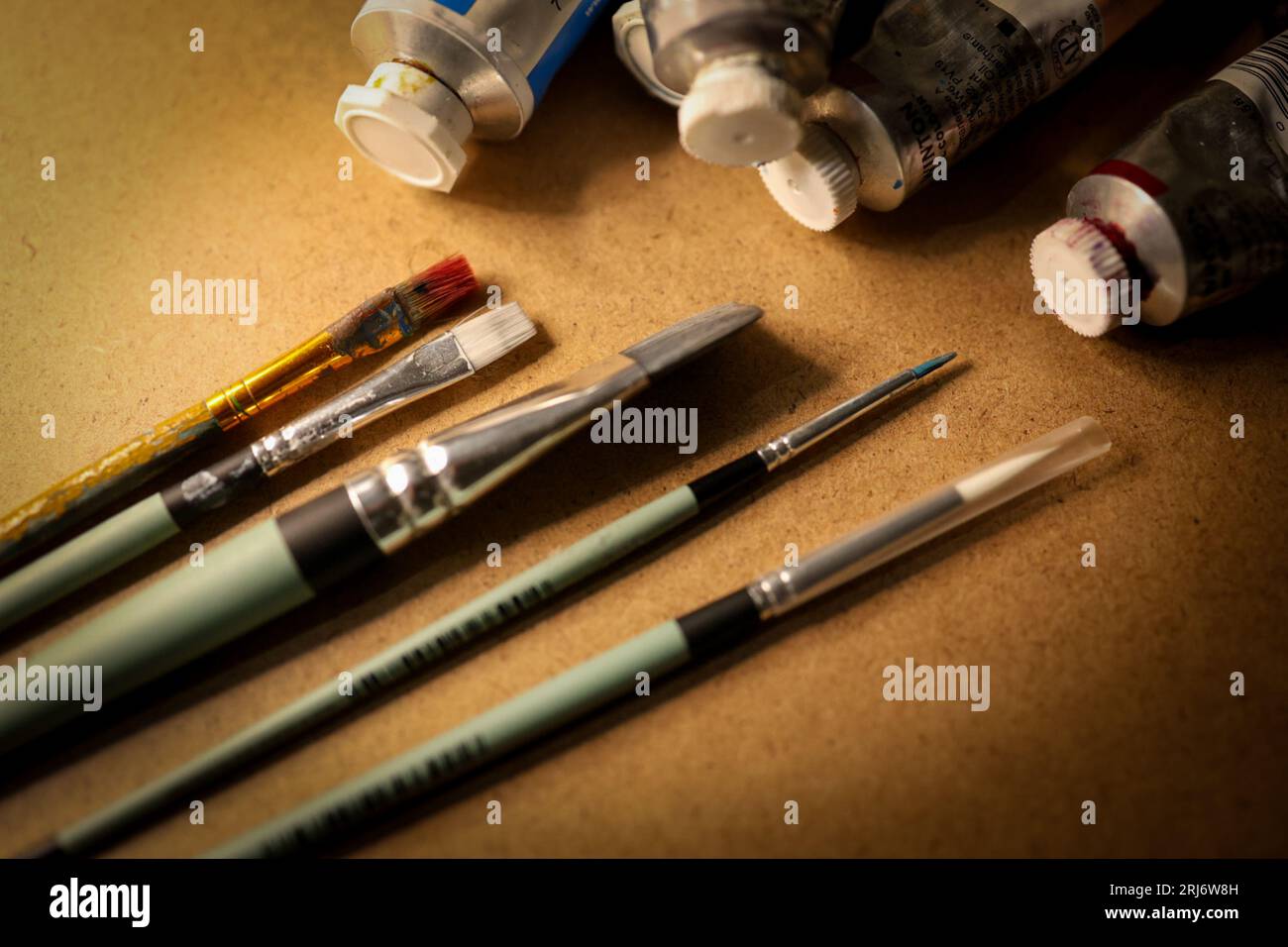 Different sizes of oil paint brushes on display Stock Photo Alamy