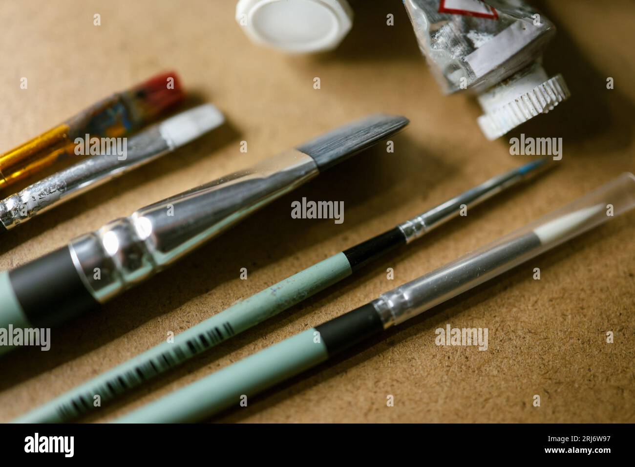 Different sizes of oil paint brushes on display Stock Photo Alamy