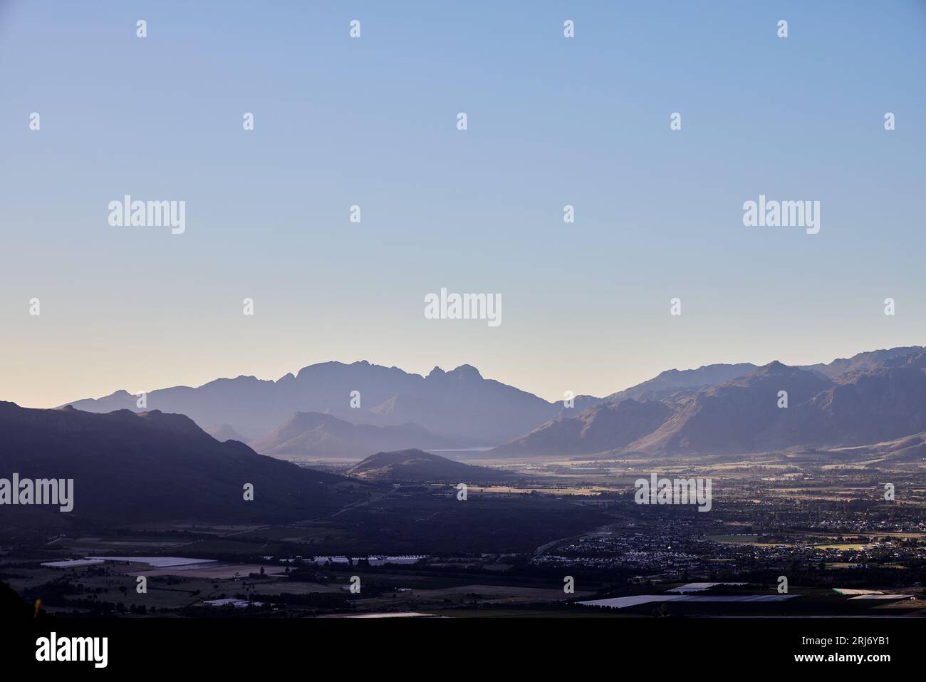 A closeup of Paarl Rocks and Paarl at the mountains of Paarl under the ...