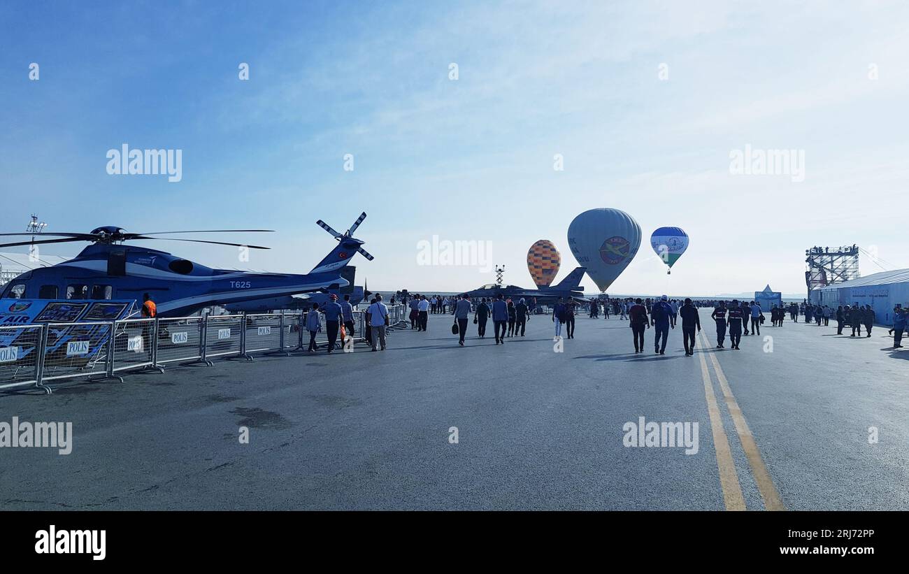 airplane event. air show including cargo planes balloons and f1 racing cars Stock Photo