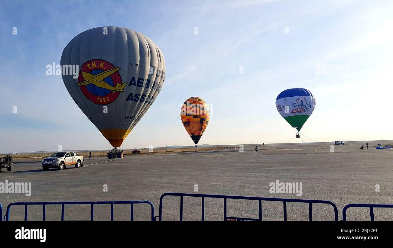 airplane event. air show including cargo planes balloons and f1 racing cars Stock Photo