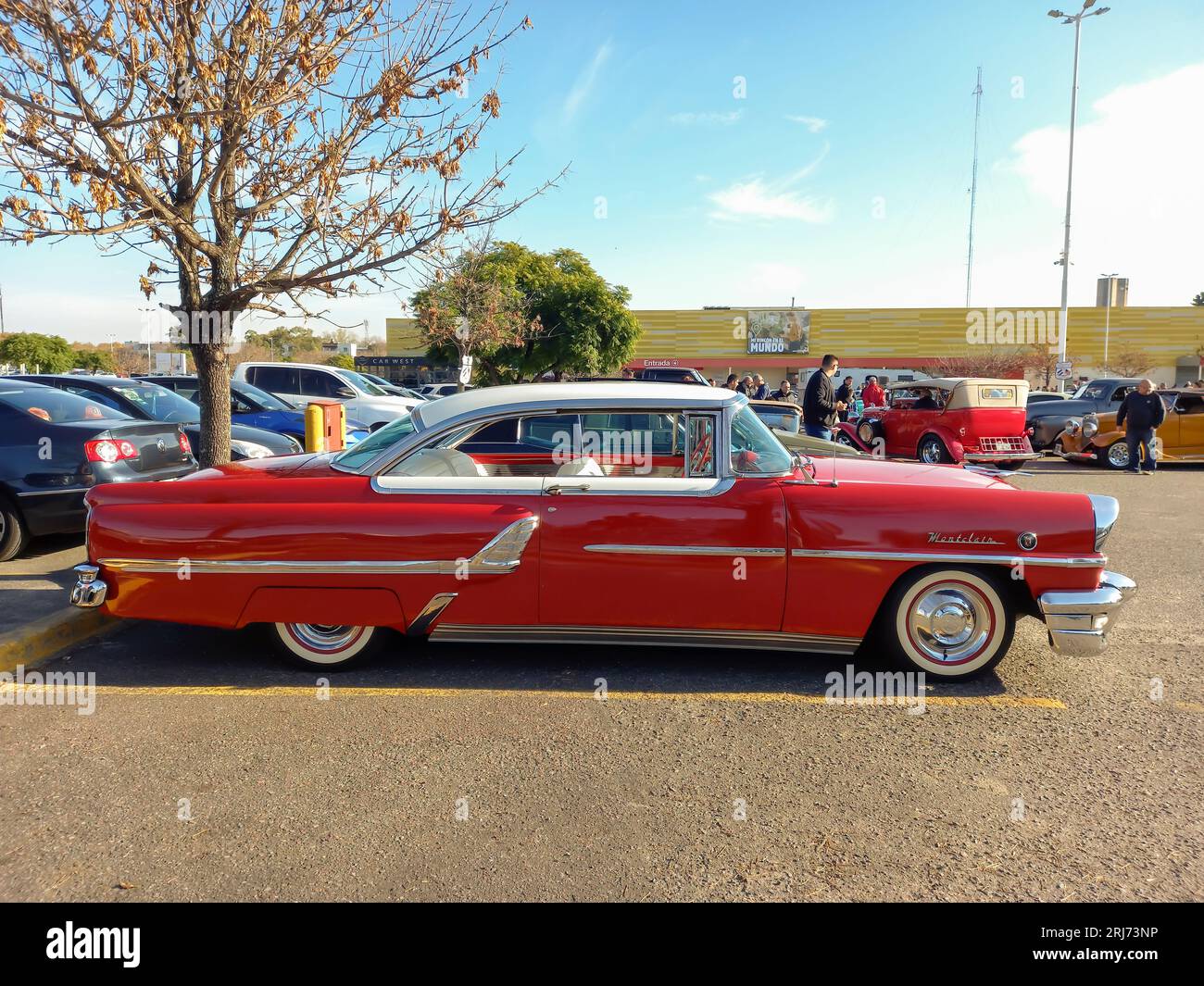 Shot of an old red 1955 Ford Mercury Montclair twodoor hardtop in a