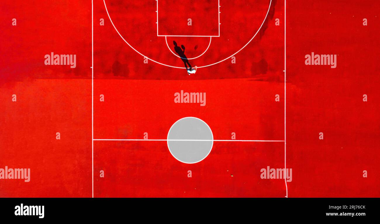 Red minimal basketball field seen from the above. Stock Photo