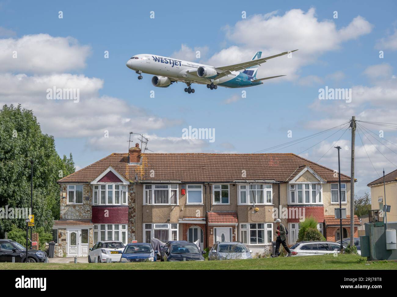 WestJet Dreamliner on landing approach to Heathrow Airport in London