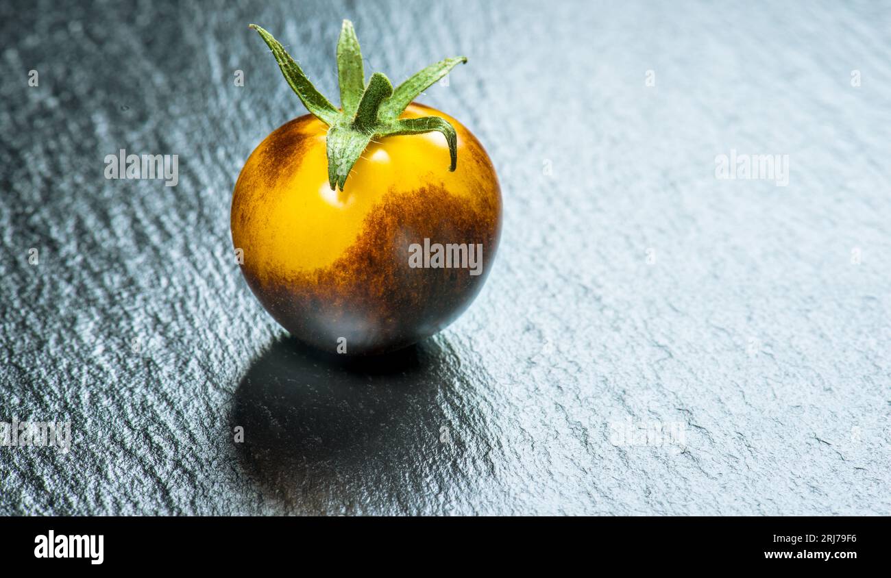 new tomato variety breeding, orange and purple Stock Photo