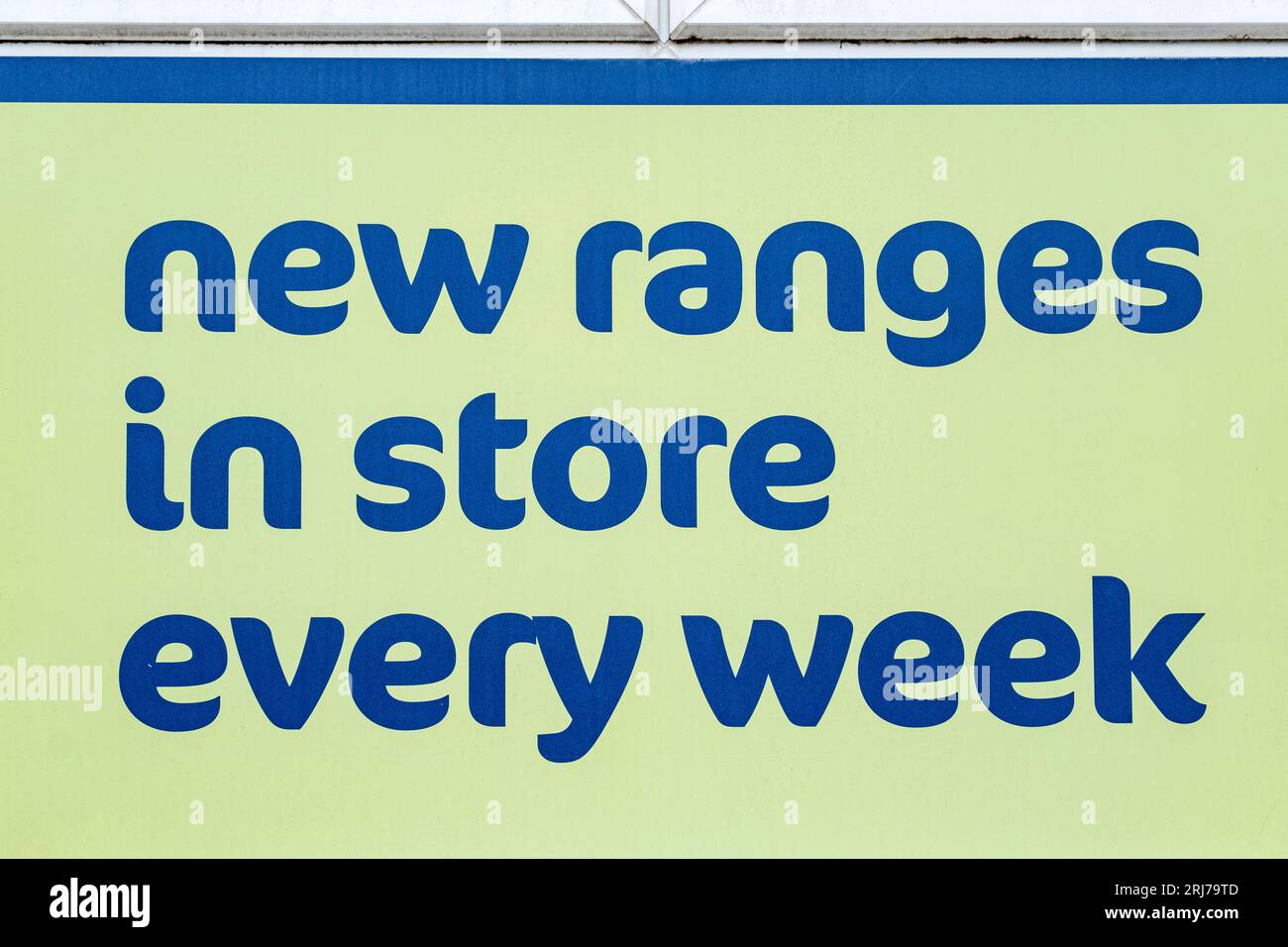 New ranges in store every week advert on outside shop wall UK Stock