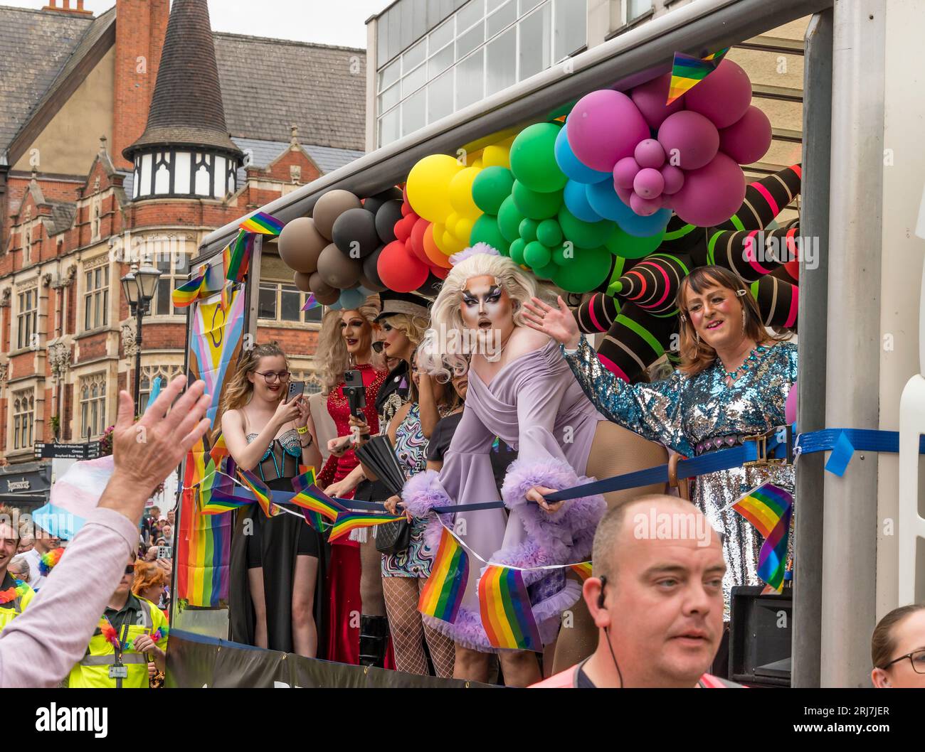 People dressed and made up on float in Lincoln Pride Parade, High
