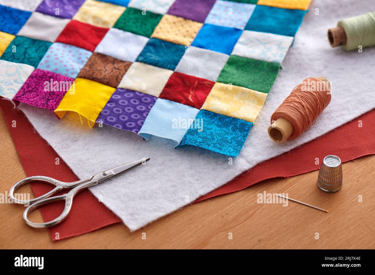 Process of quilt sandwich assembling, sewing accessories Stock Photo