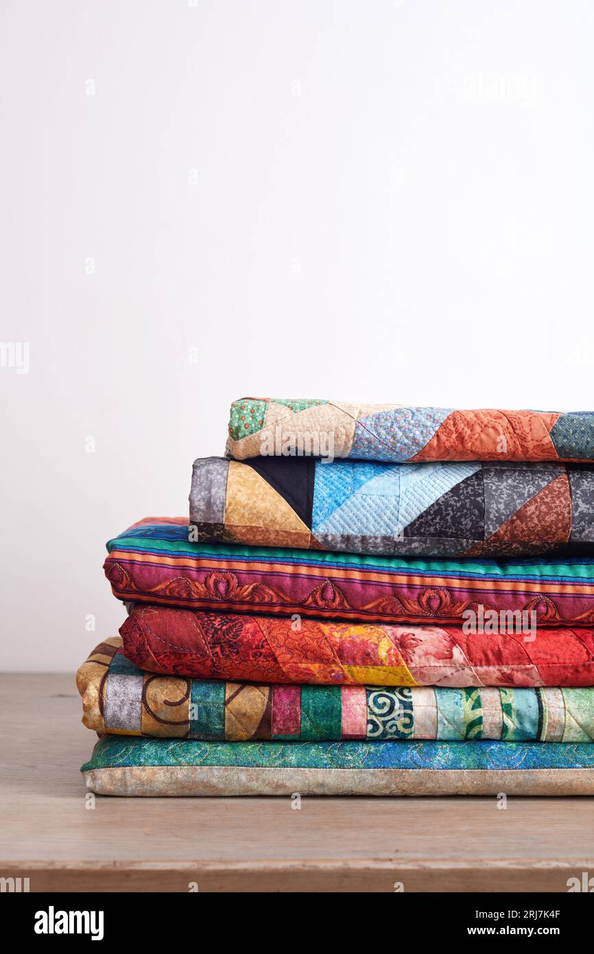 Pile of quilts hi-res stock photography and images - Alamy