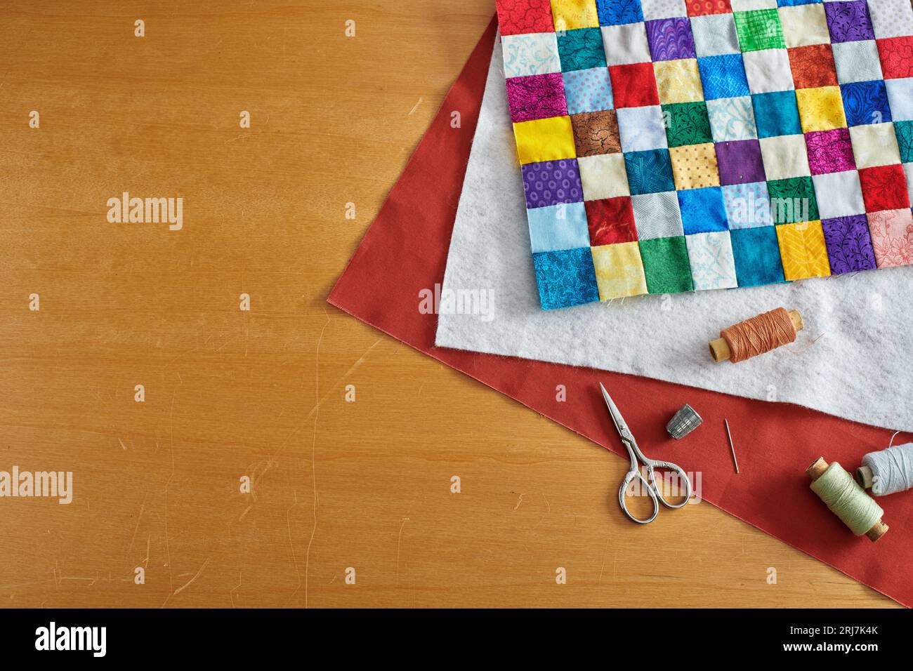 Process of quilt sandwich assembling, sewing accessories Stock Photo