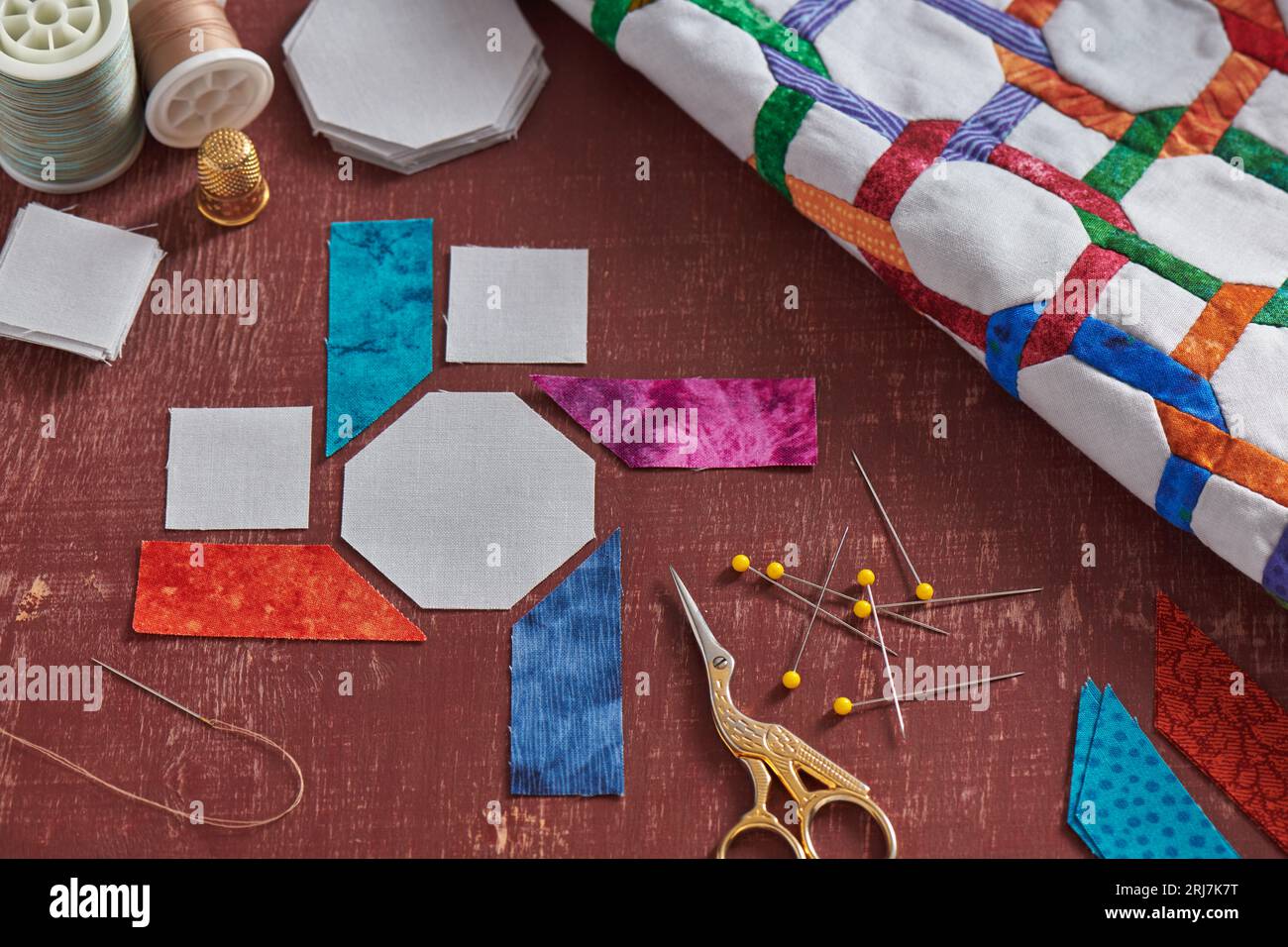 The preparation of fabrics pieces for a quilting blocks sewing