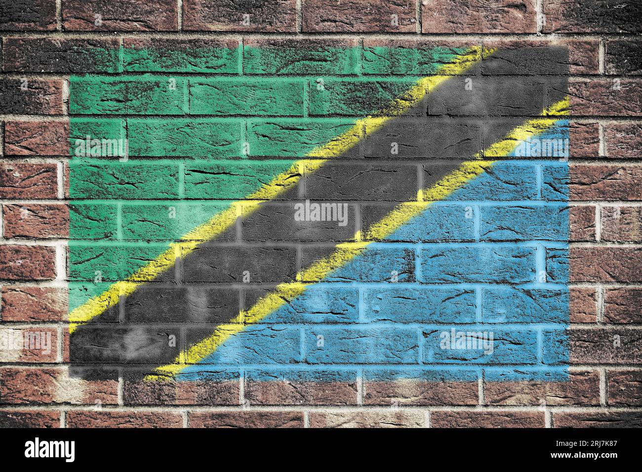 Tanzania flag on a brick wall background Stock Photo