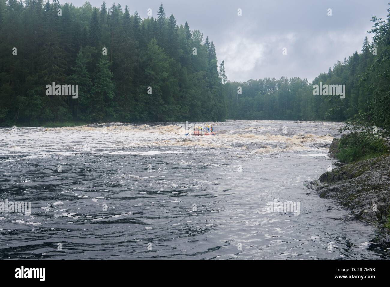 Karelia, Russia - July 24, 2023: Team On A Raft Passes The Rapids On ...