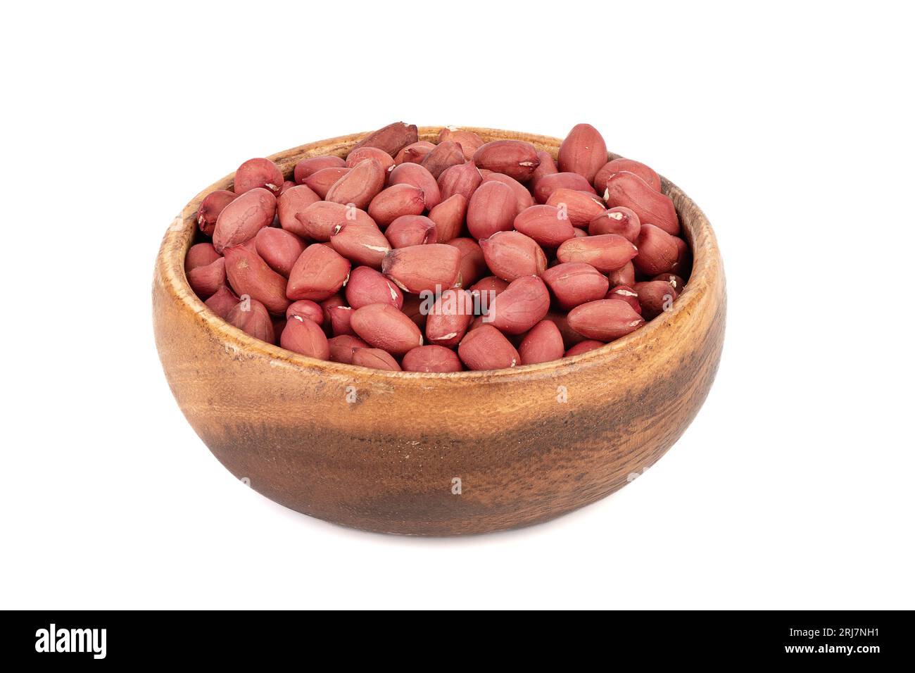 Bowl with shelled peanuts isolated on white background. Close up. Stock Photo