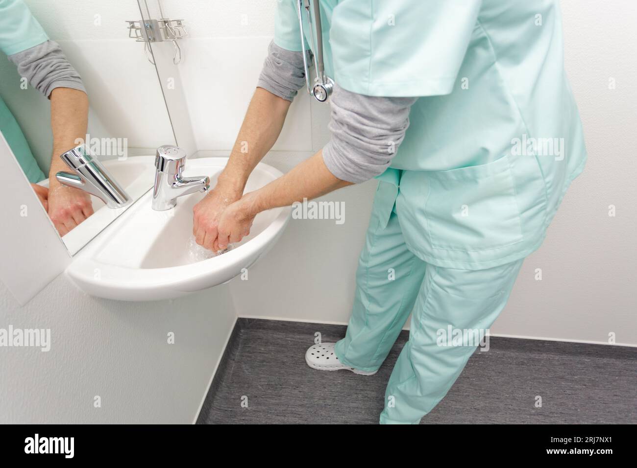 nurse washes hes hands before the procedure surgical handwashing Stock Photo Alamy