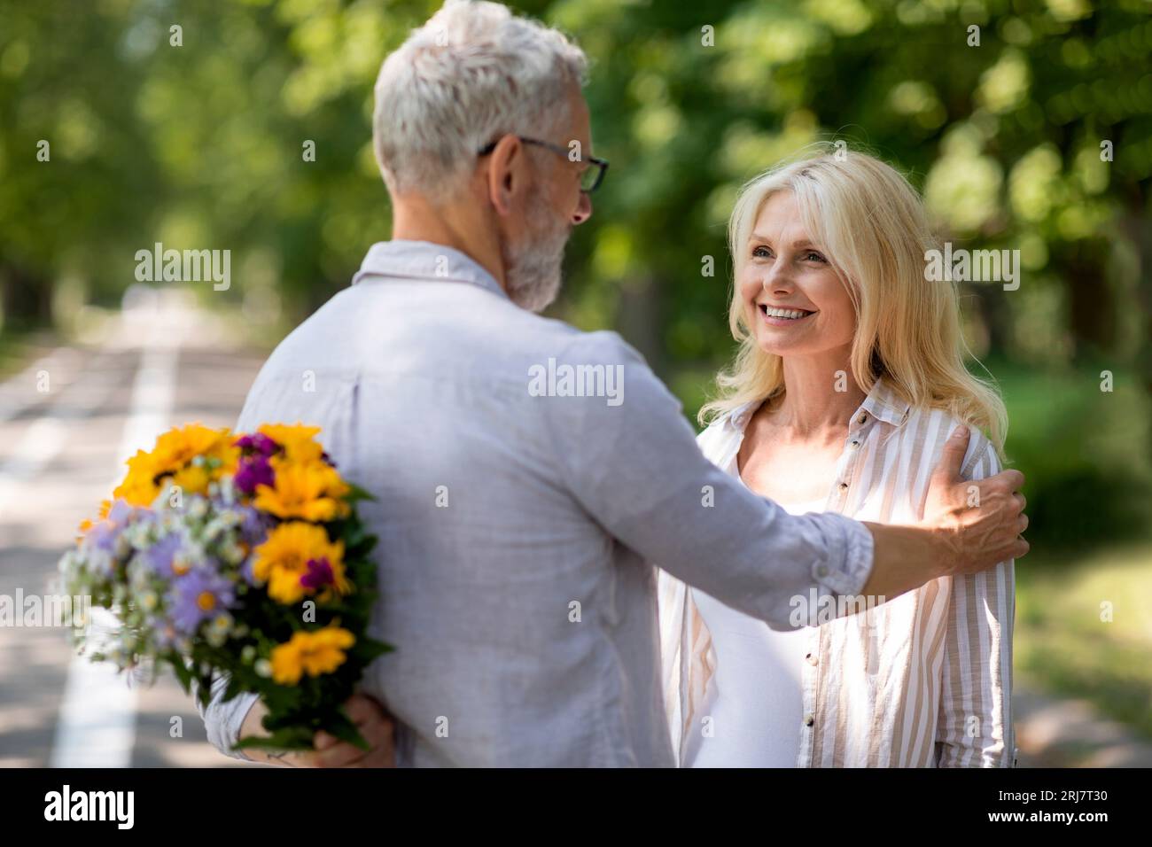 Old man hands behind back hi-res stock photography and images - Alamy