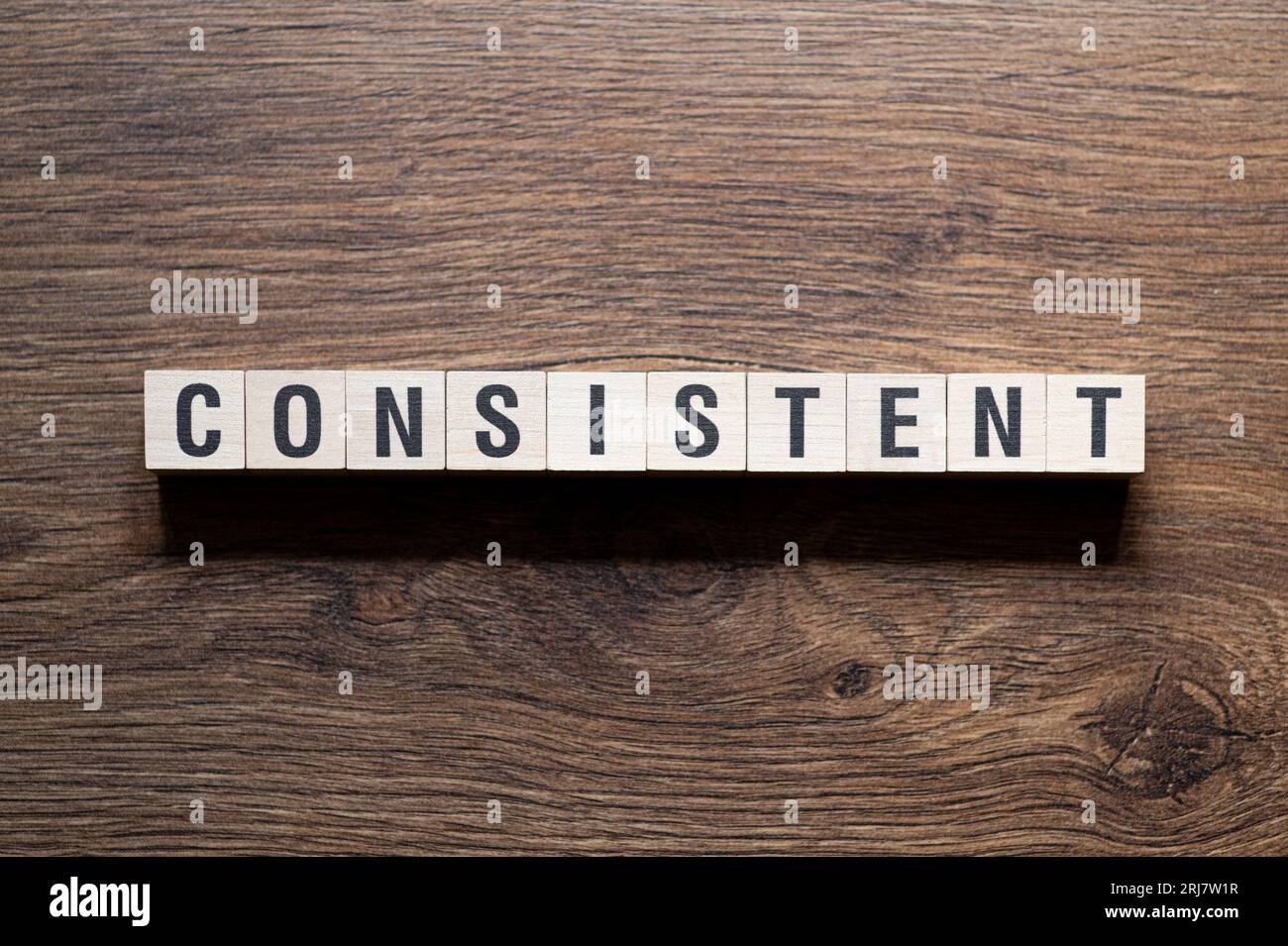 Consistent word concept on building blocks, text Stock Photo Alamy