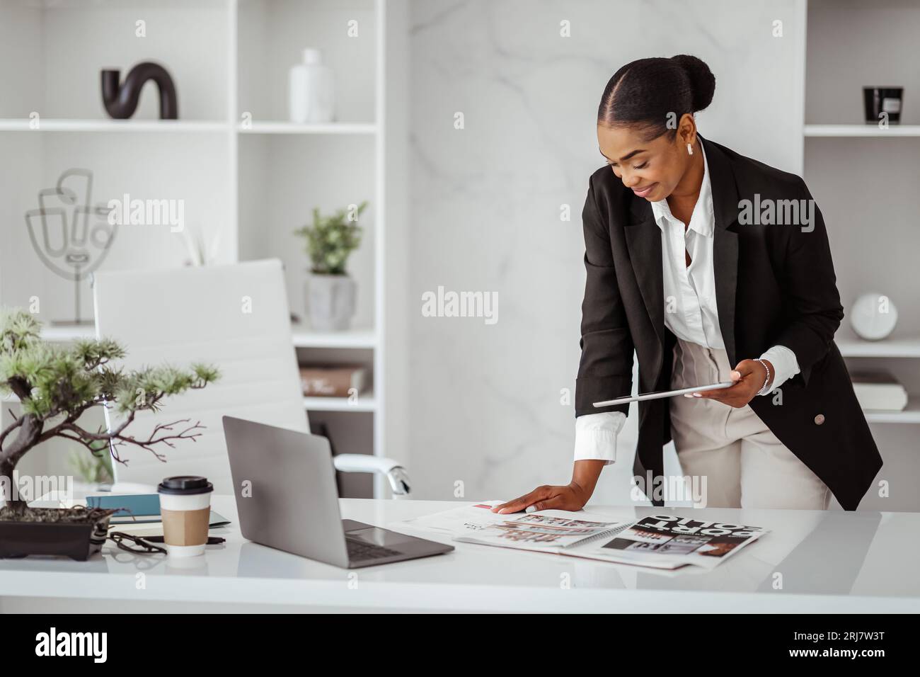 Female attractive journalist working on hi-res stock photography and ...