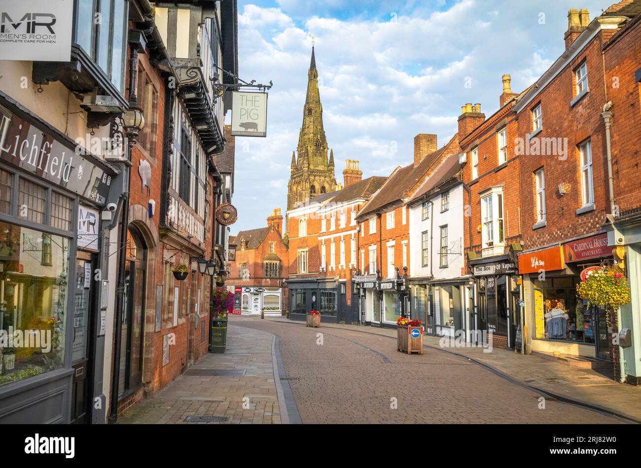 A view at sunrise of St Mary's Church spire from Tamworth Street in the centre of this ancient and historic city in Staffordshire, UK. Stock Photo
