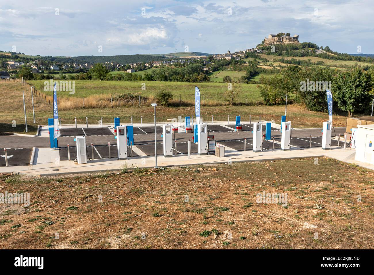 An EV charging station at a French service station on a Peage motorway. Stock Photo
