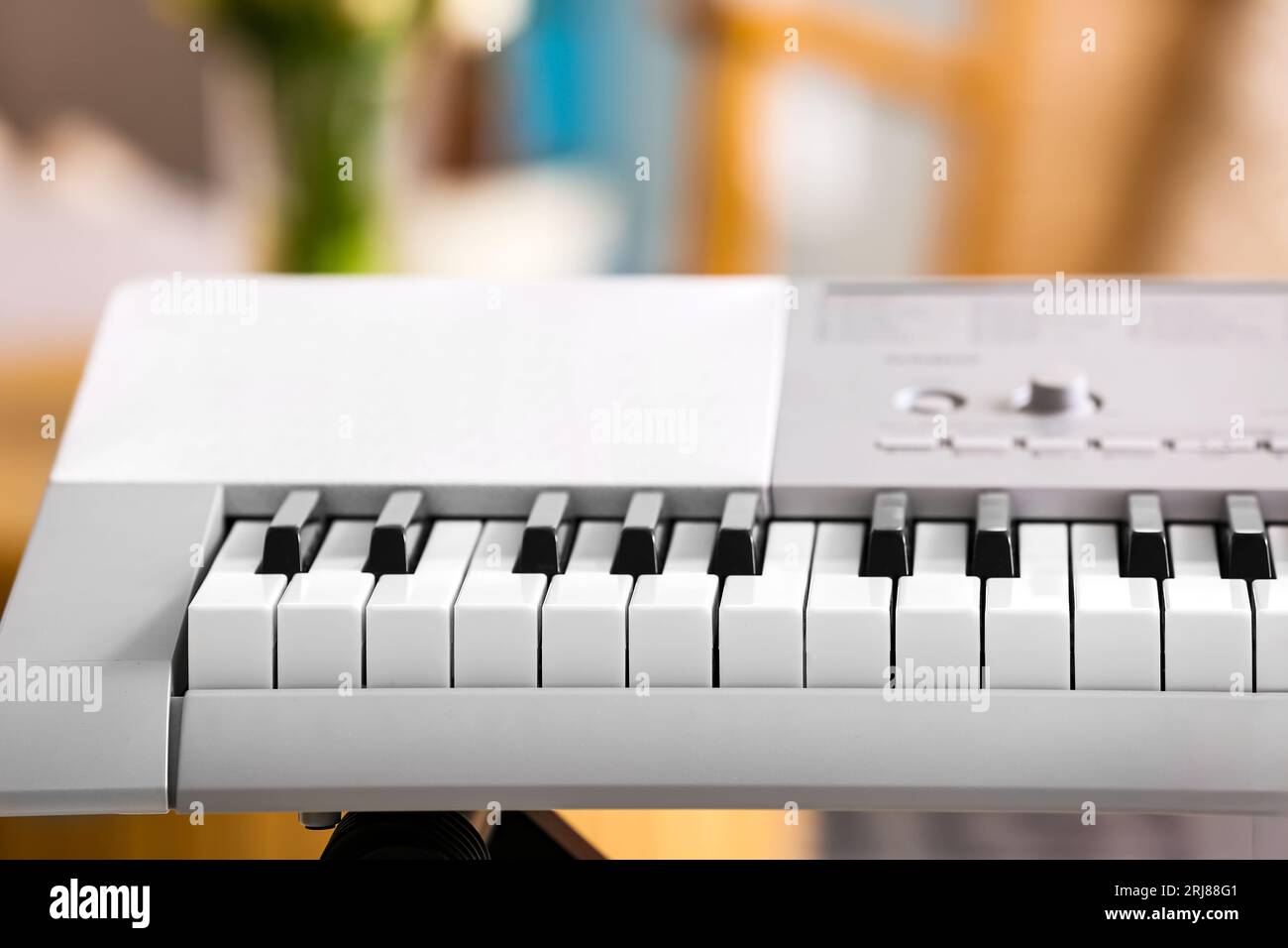 Modern synthesizer in room, closeup Stock Photo