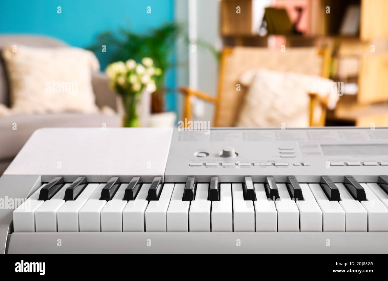 Modern synthesizer in room, closeup Stock Photo