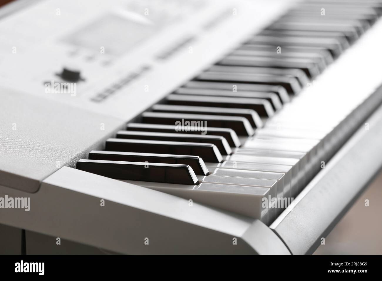 Modern synthesizer in room, closeup Stock Photo
