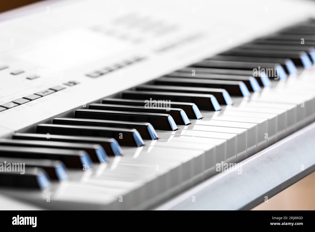 Modern synthesizer in room, closeup Stock Photo