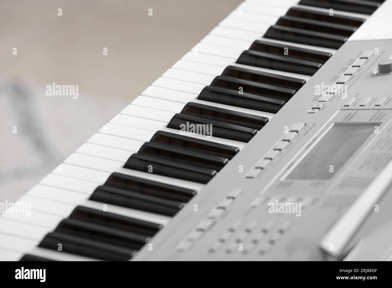 Modern synthesizer in room, closeup Stock Photo